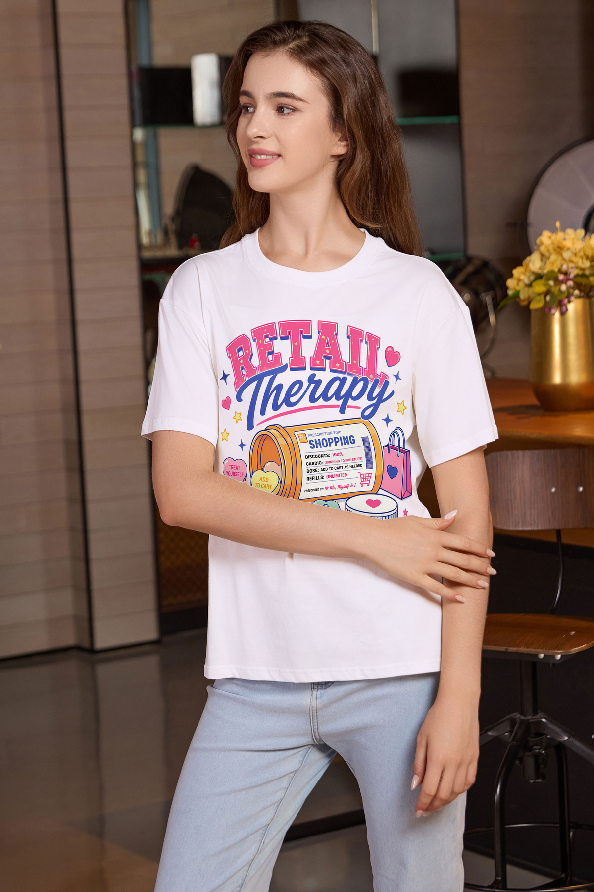 M001-F021 WHITE F2 — Retail Therapy graphic on M001 white garment
