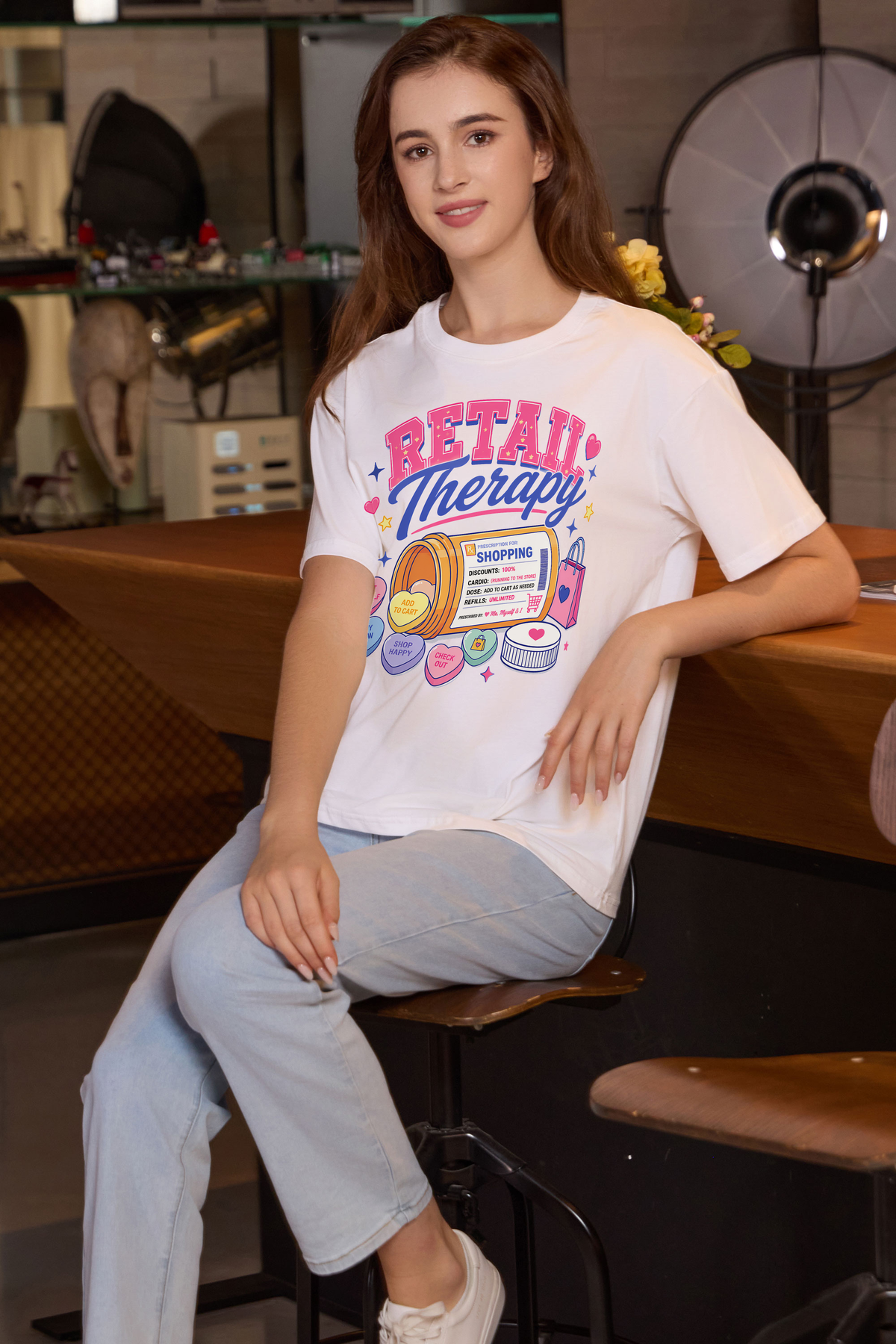 M001-F021 WHITE F3 — Retail Therapy graphic on M001 white garment