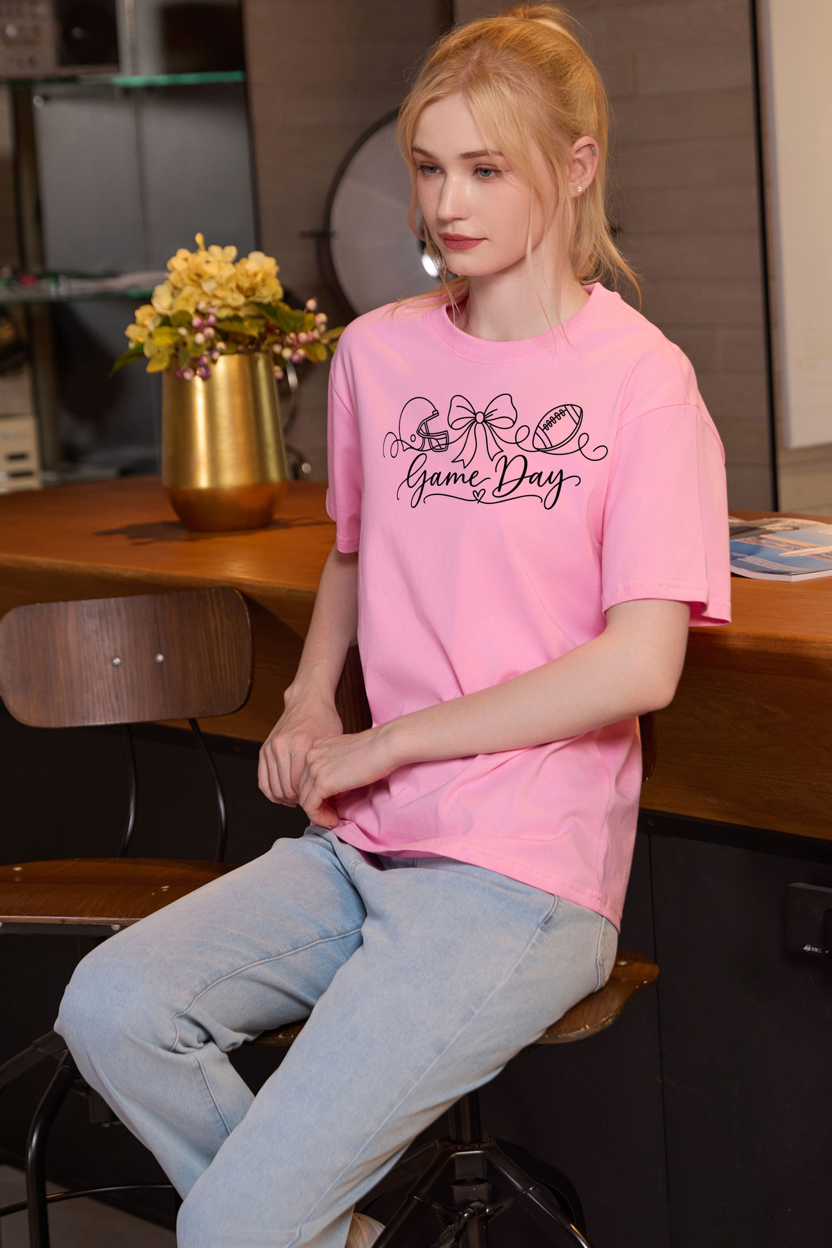 M001-G020 LIGHT-PINK F3 β Game Day String graphic on M001 light pink garment