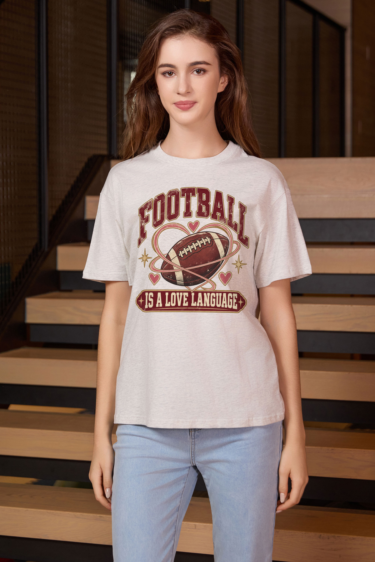 Football Is a Love Language Relaxed Tee in heather grey, front graphic on model, view 2