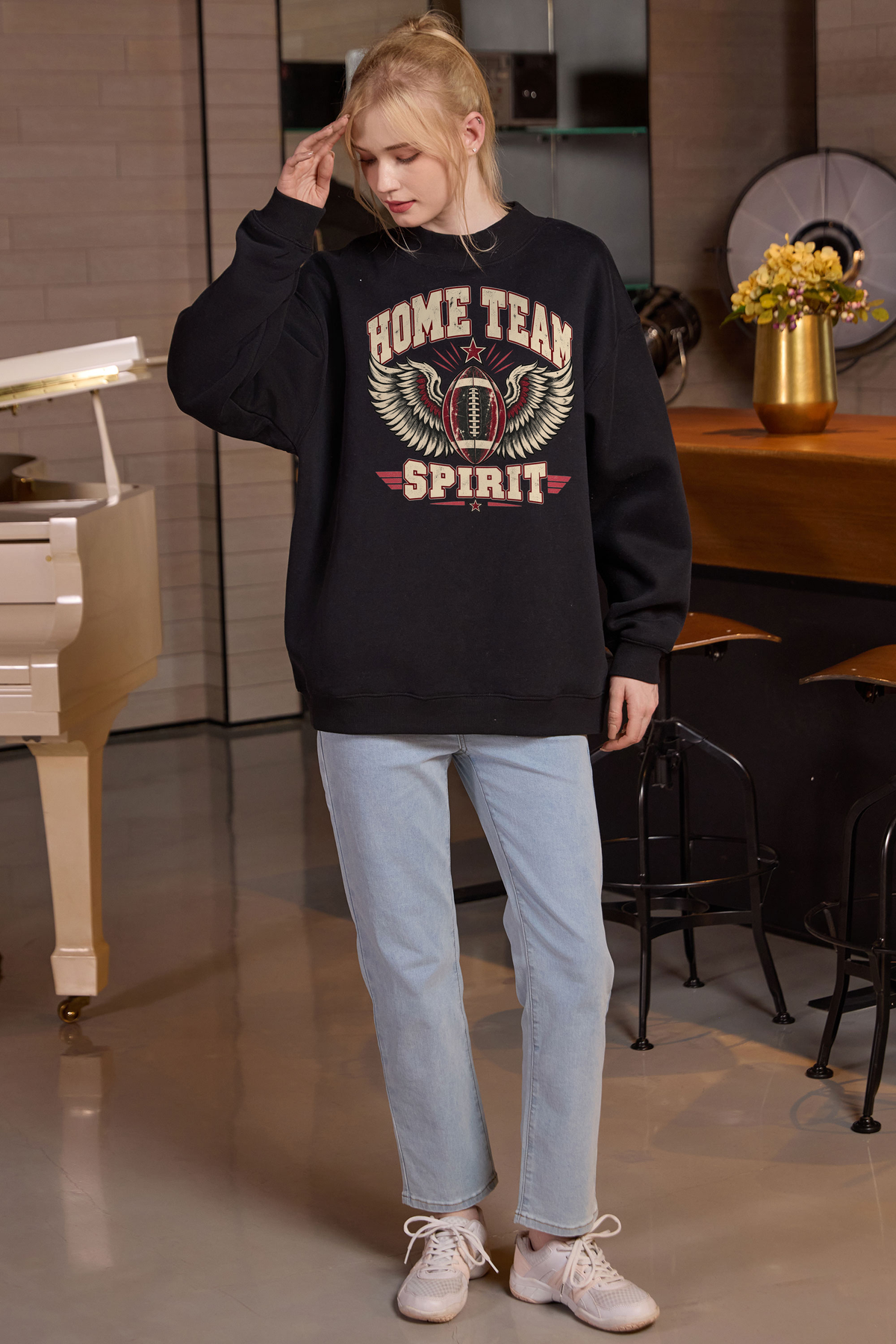 Home Team Spirit Mockneck Sweatshirt in black, front graphic on model, view 2