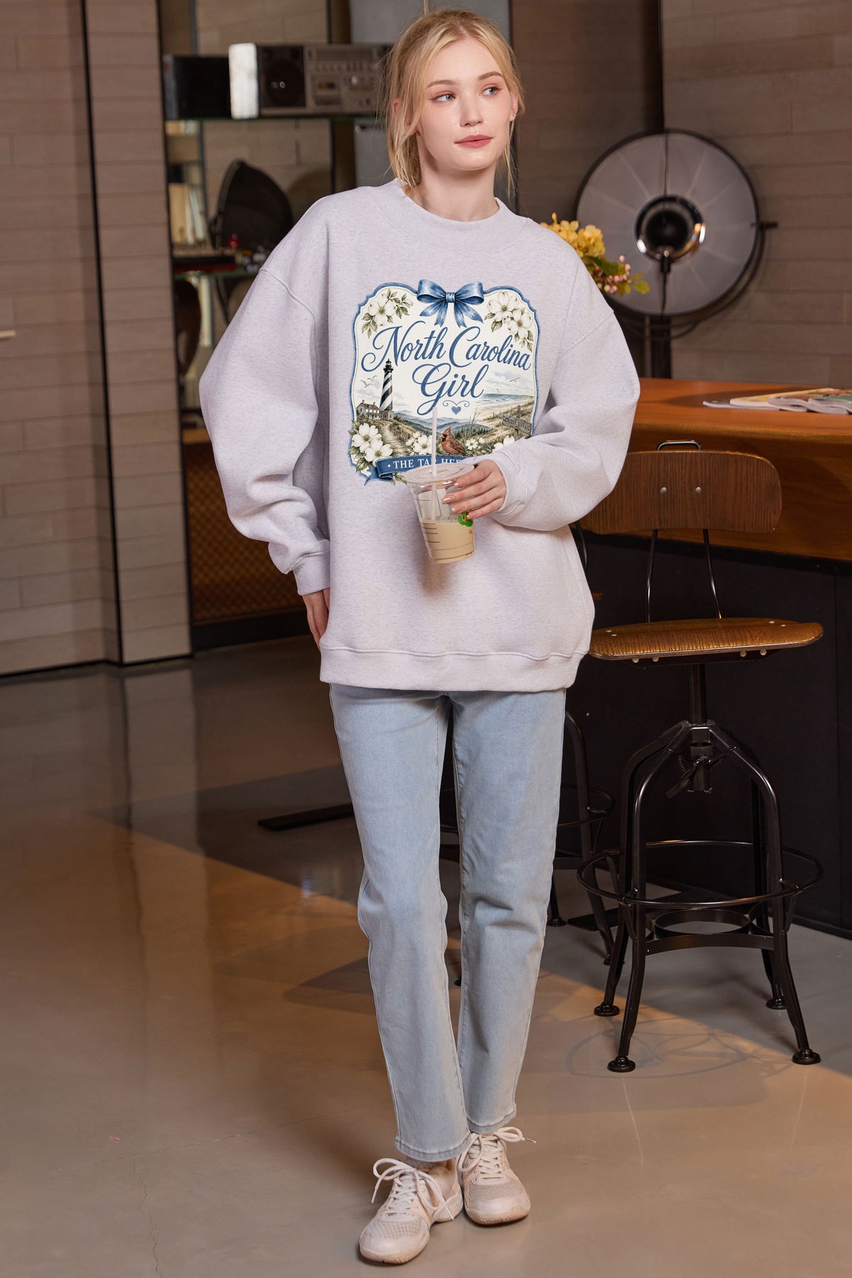 North Carolina Girl Illustrated Sweatshirt in heather grey — model view 1.