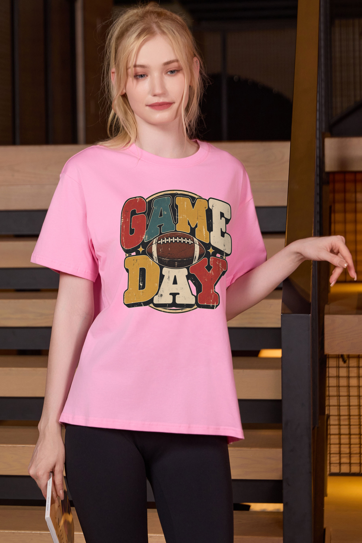 Retro Game Day Relaxed Tee in light pink with multicolour GAME DAY lettering and a football graphic.