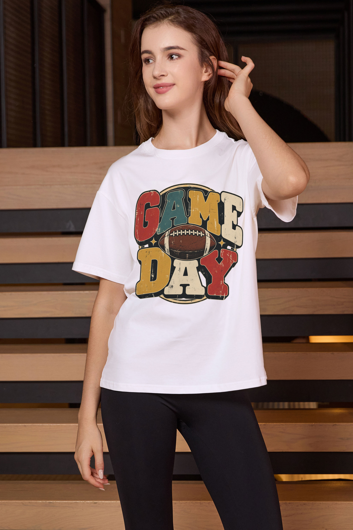 Retro Game Day Relaxed Tee in white with multicolour GAME DAY lettering and a football graphic.