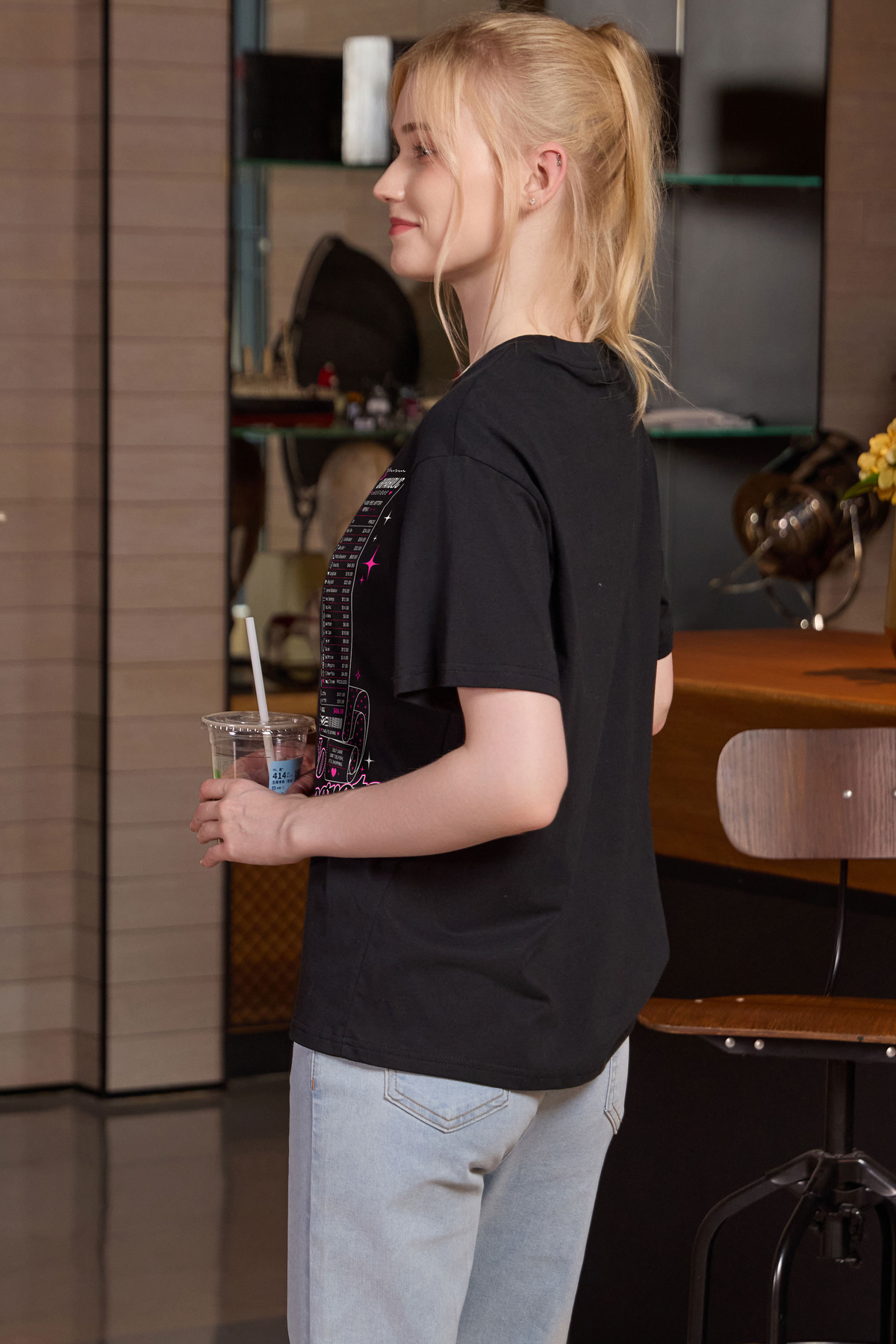 M001-F019 BLACK S1 — No regrets graphic on M001 black garment