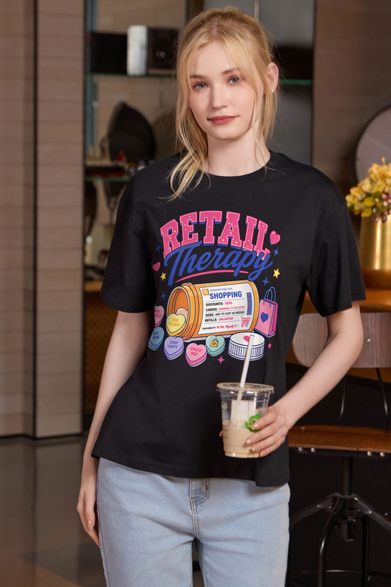 M001-F021 BLACK F1 — Retail Therapy graphic on M001 black garment