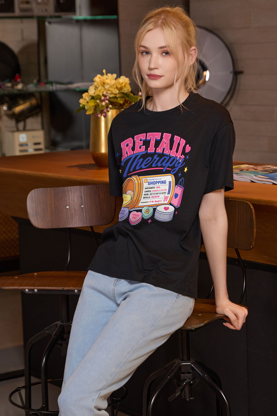 M001-F021 BLACK F2 — Retail Therapy graphic on M001 black garment