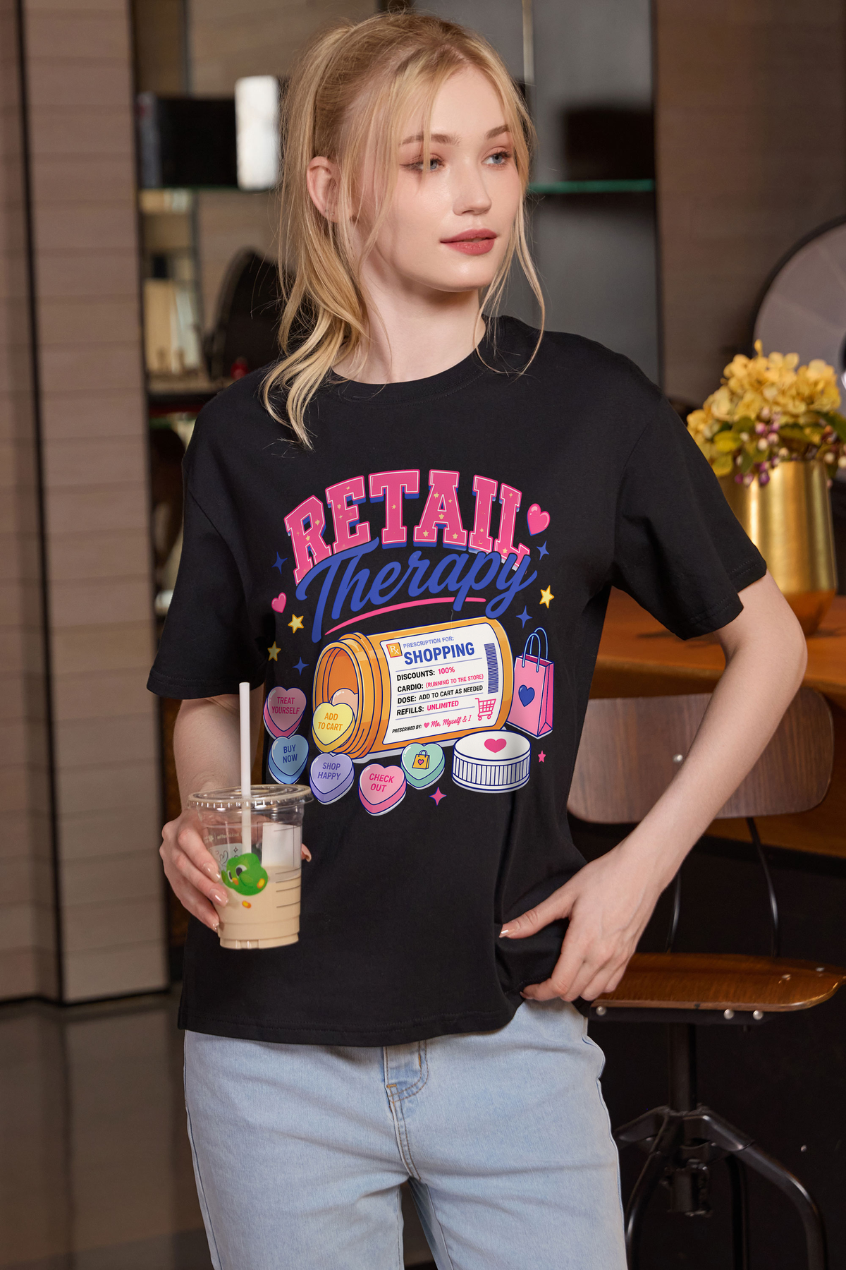 M001-F021 BLACK F3 — Retail Therapy graphic on M001 black garment