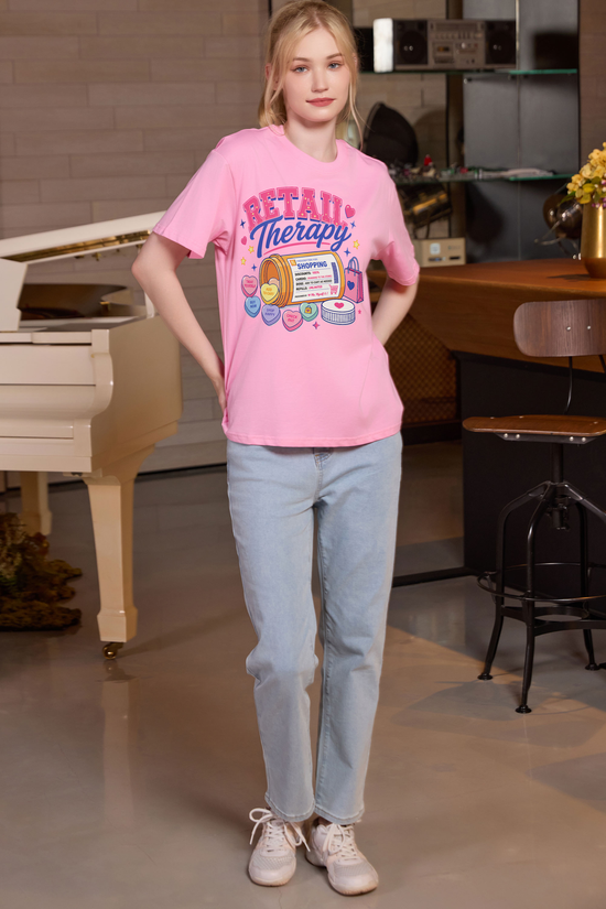M001-F021 LIGHT-PINK A1 — Retail Therapy graphic on M001 light pink garment
