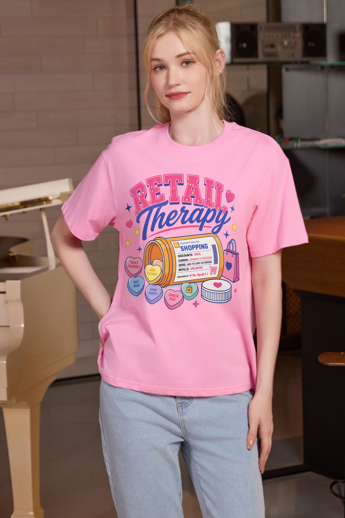 M001-F021 LIGHT-PINK F1 — Retail Therapy graphic on M001 light pink garment