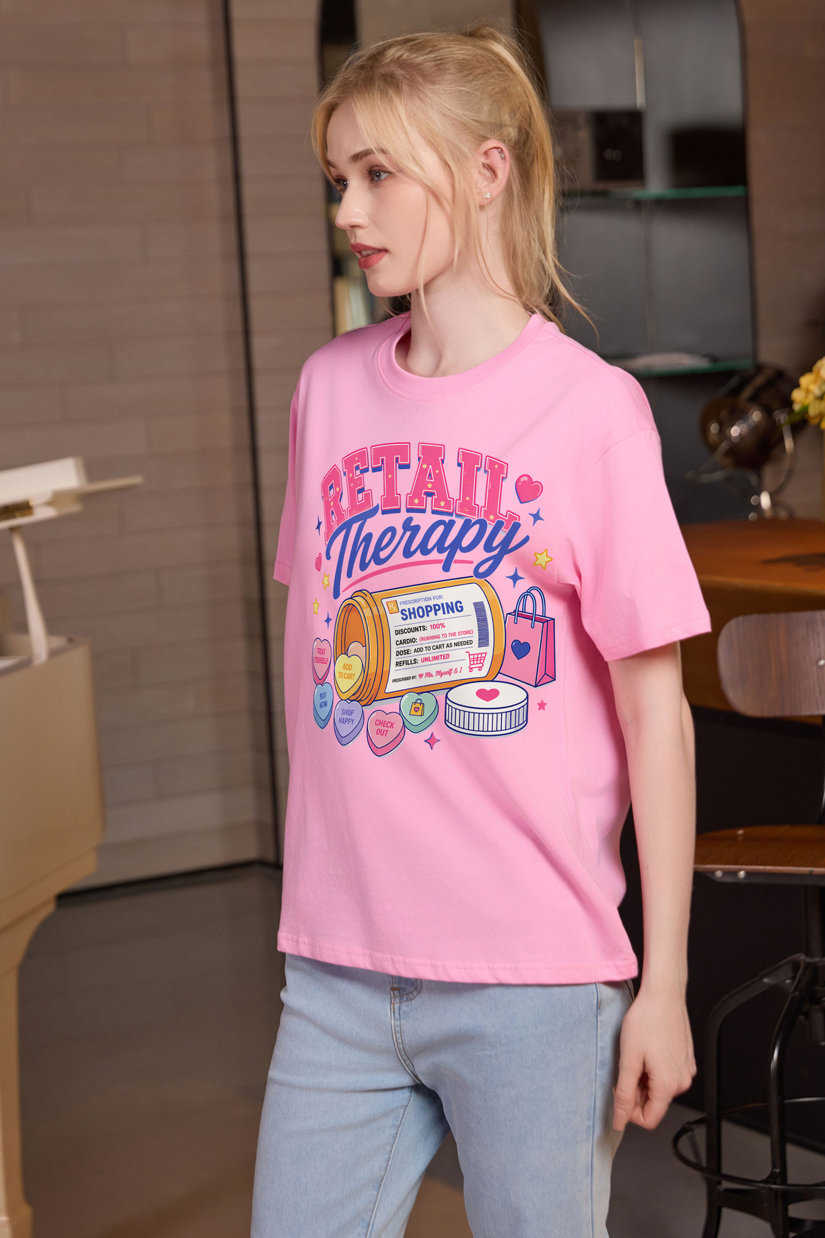 M001-F021 LIGHT-PINK F2 — Retail Therapy graphic on M001 light pink garment