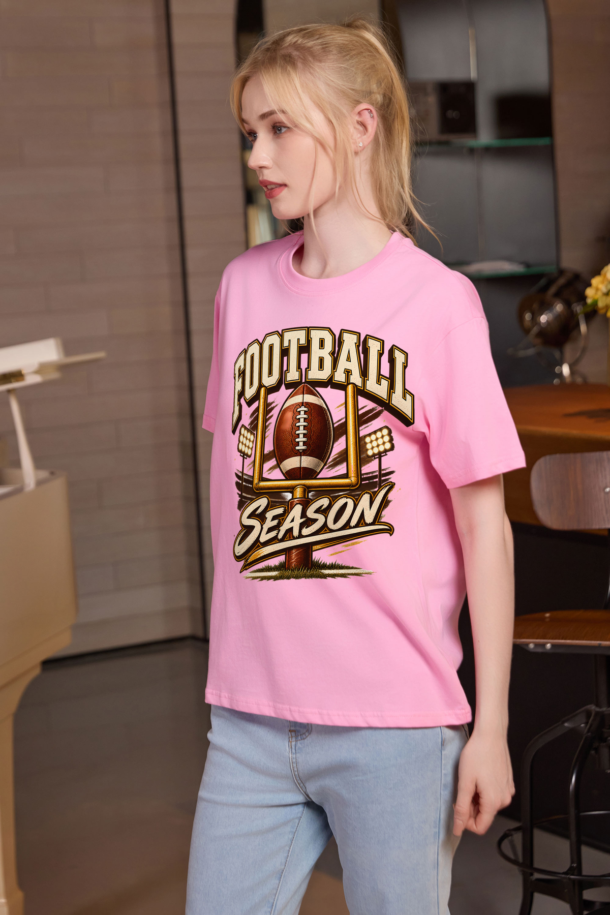 M001-G013 LIGHT-PINK F2 — Football Goalpost graphic on M001 light pink garment