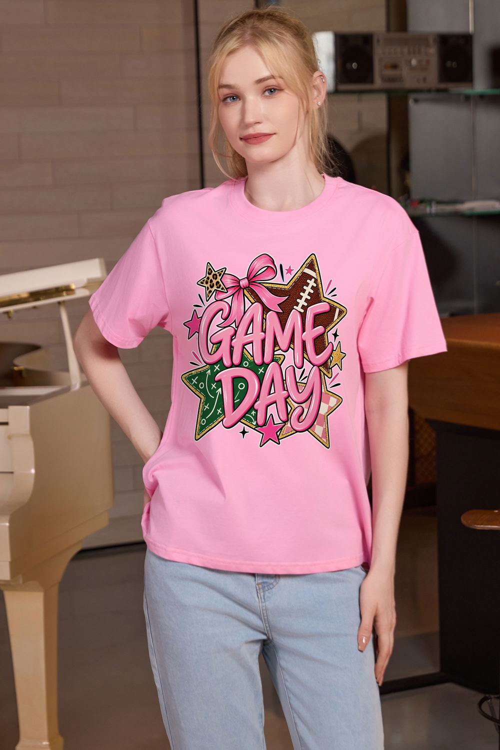 M001-G016 LIGHT-PINK F1 — Game Day Stars graphic on M001 light pink garment