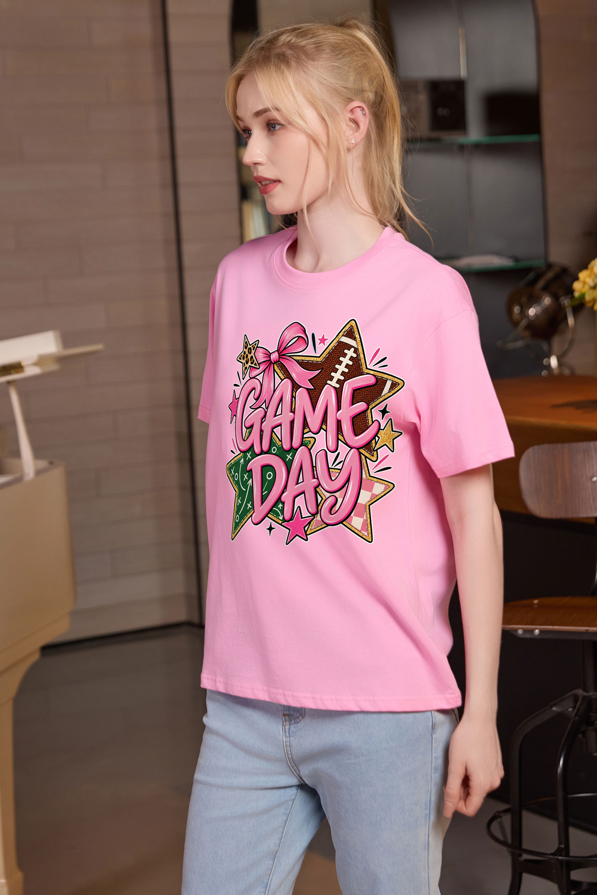 M001-G016 LIGHT-PINK F2 — Game Day Stars graphic on M001 light pink garment