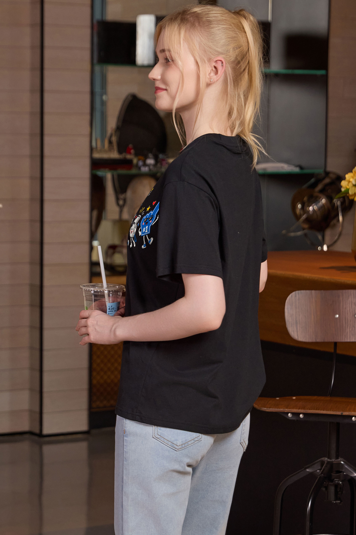 M001-G019 BLACK S1 — Game Day Characters 2 graphic on M001 black garment