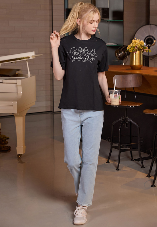 M001-G020 BLACK A1 — Game Day String graphic on M001 black garment