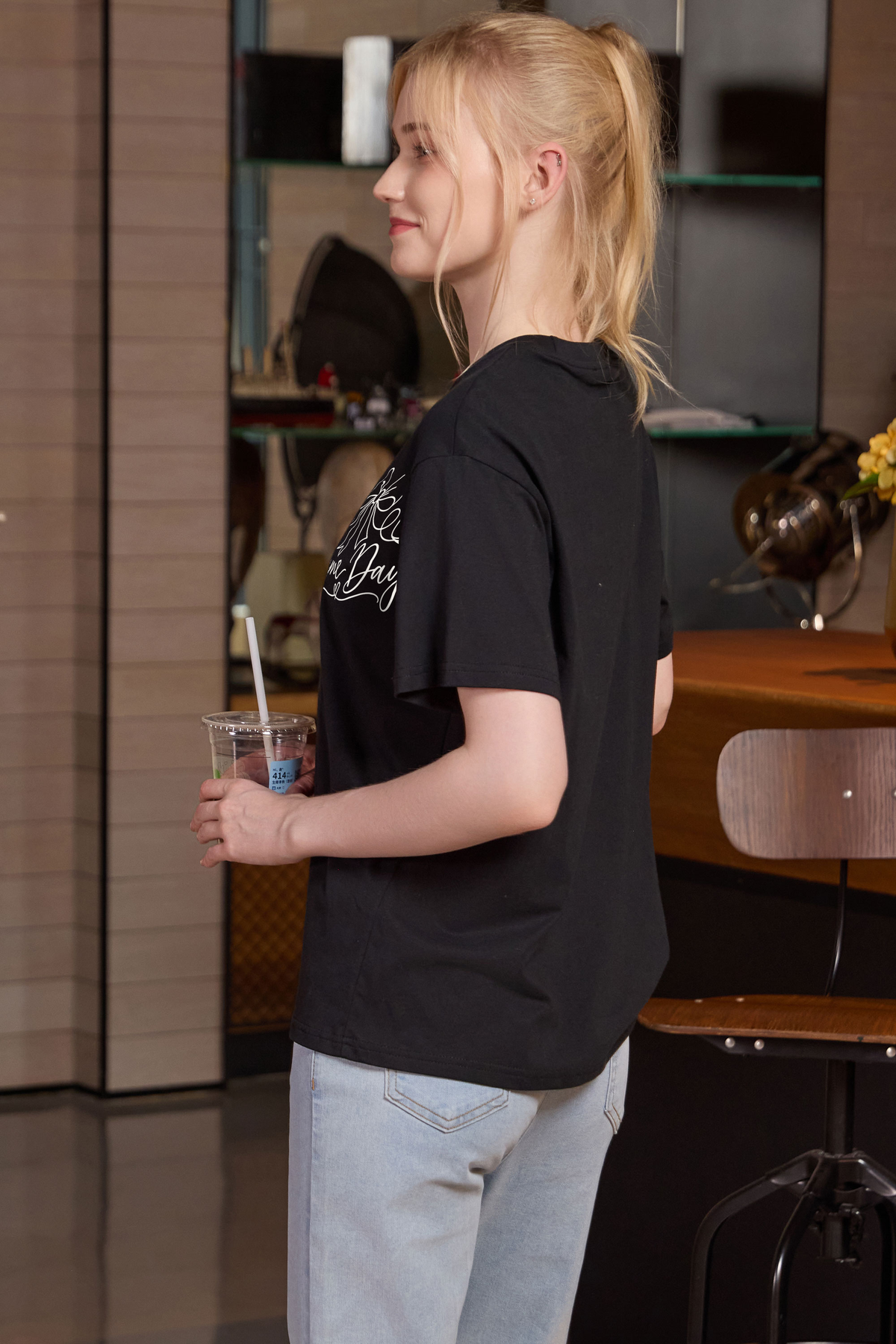 M001-G020 BLACK S1 — Game Day String graphic on M001 black garment
