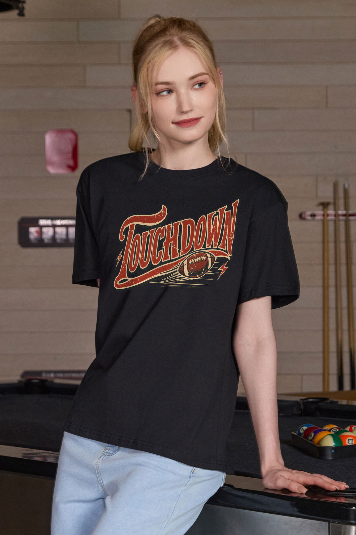 Retro Touchdown Relaxed Tee in black, front graphic on model, view 3