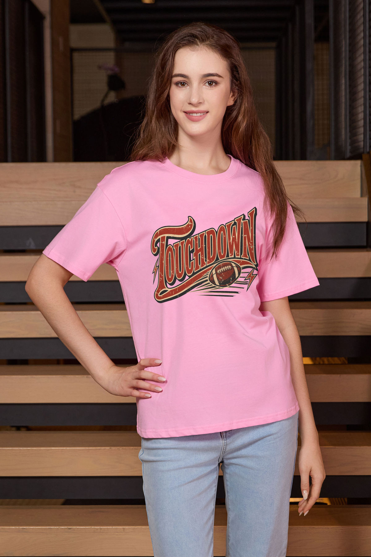 Retro Touchdown Relaxed Tee in light pink, front graphic on model, view 1