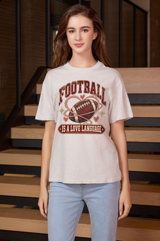Football Is a Love Language Relaxed Tee in heather grey, front graphic on model, view 2