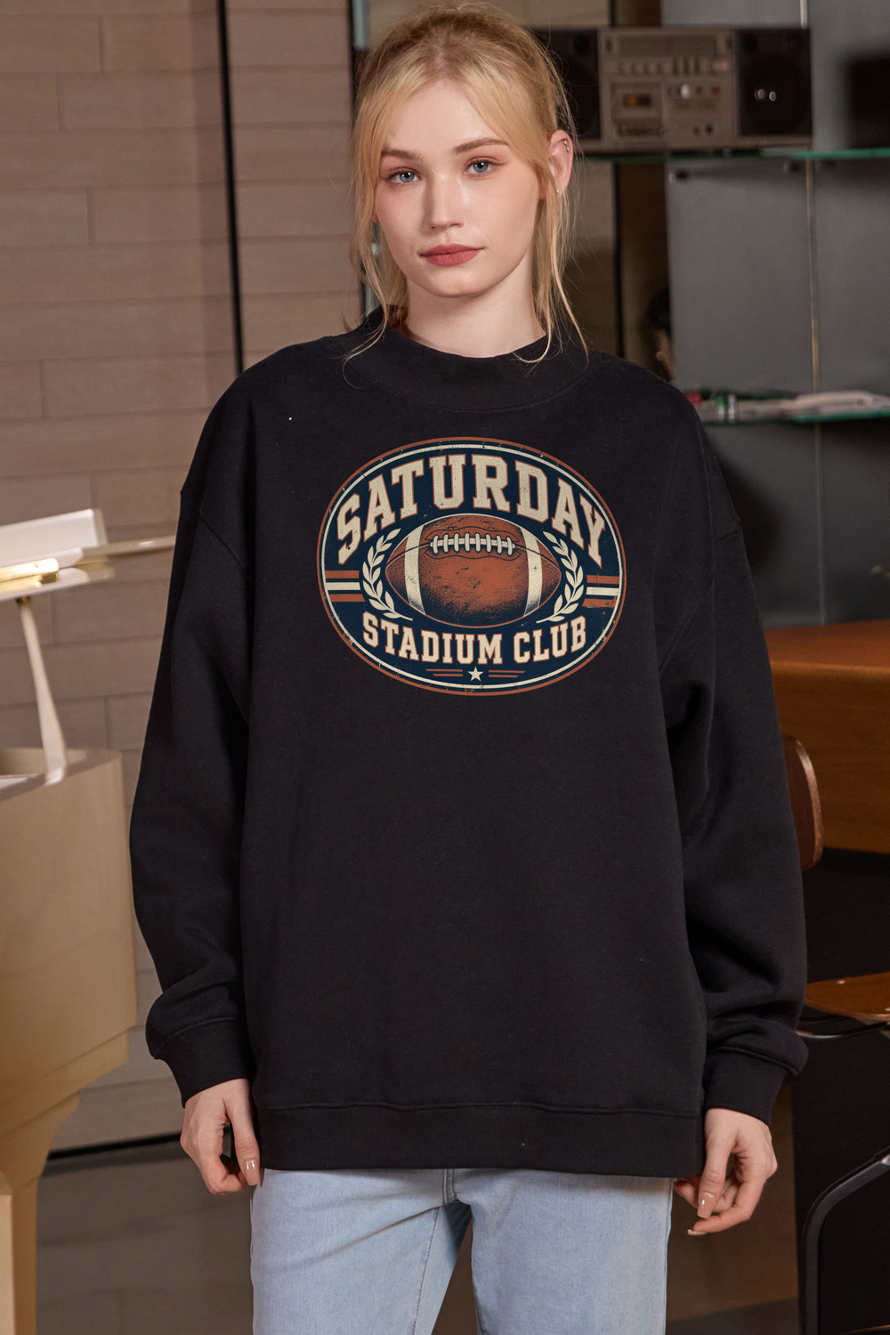 Saturday Stadium Club Mockneck Sweatshirt in black, front graphic on model, view 1