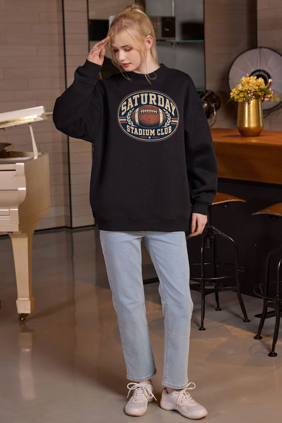 Saturday Stadium Club Mockneck Sweatshirt in black, front graphic on model, view 3