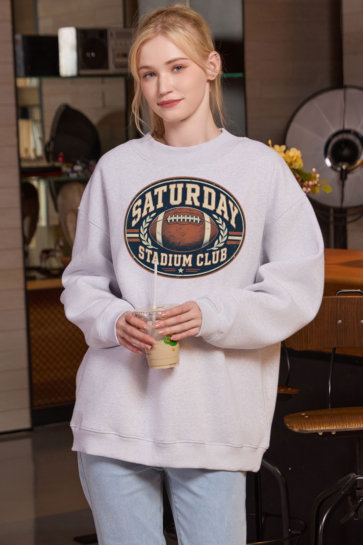 Saturday Stadium Club Mockneck Sweatshirt in heather grey, front graphic on model, view 2