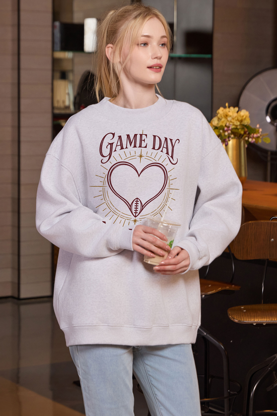 All Heart Game Day Mockneck Sweatshirt in heather grey, front graphic on model, view 3