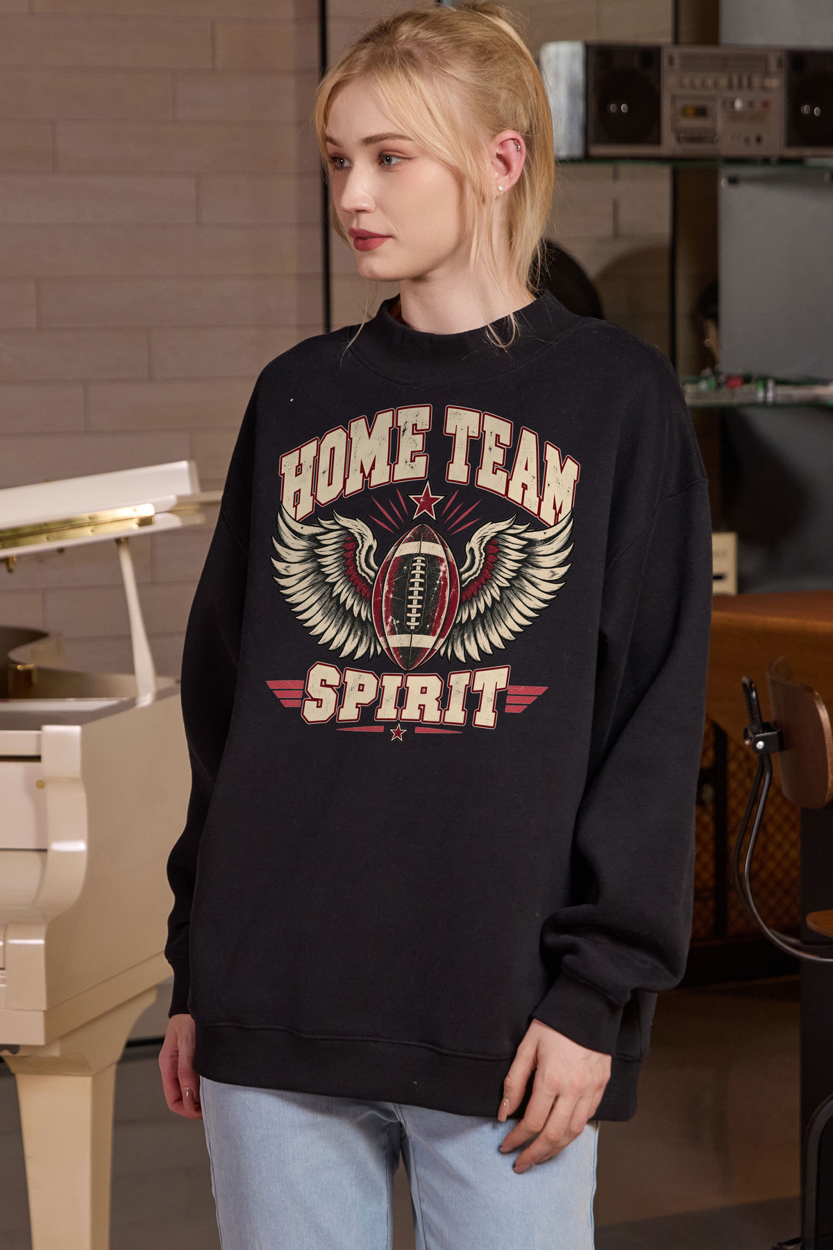 Home Team Spirit Mockneck Sweatshirt in black, front graphic on model, view 3
