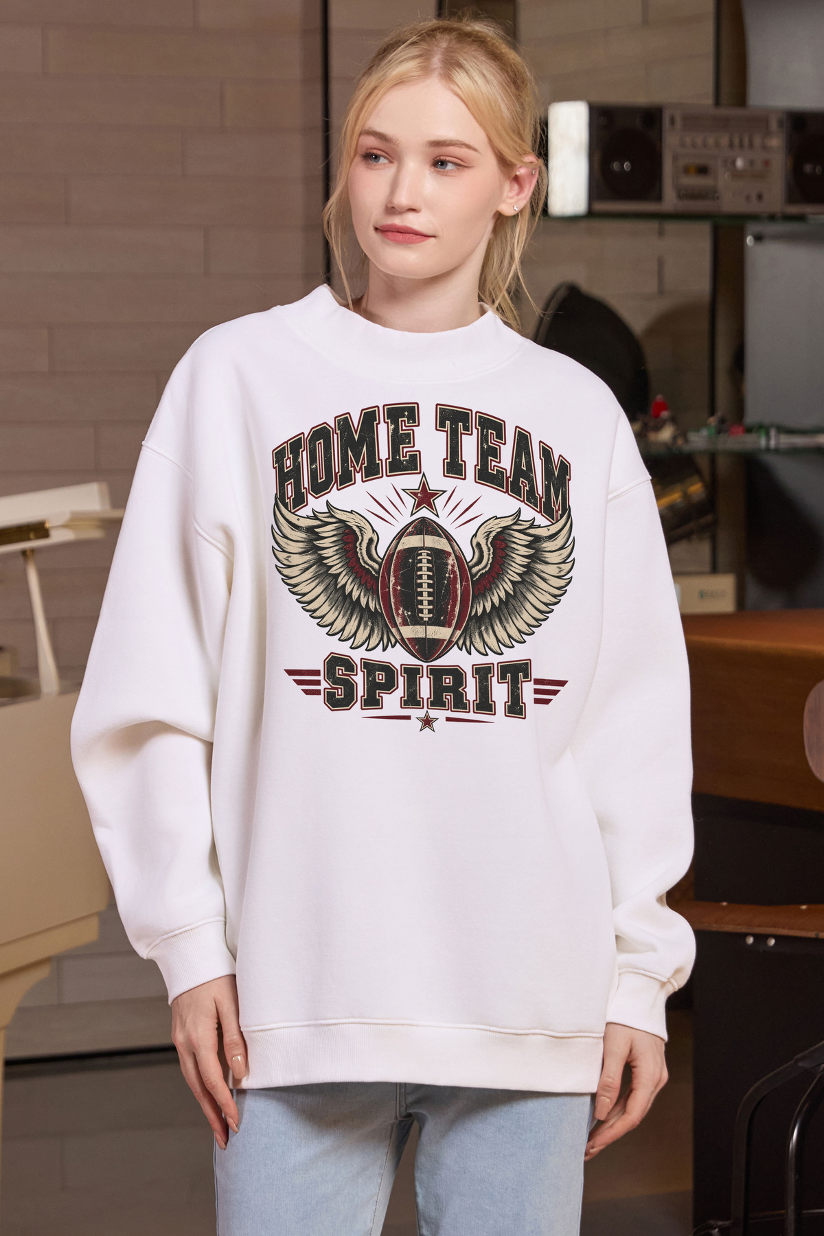 Home Team Spirit Mockneck Sweatshirt in white, front graphic on model, view 1