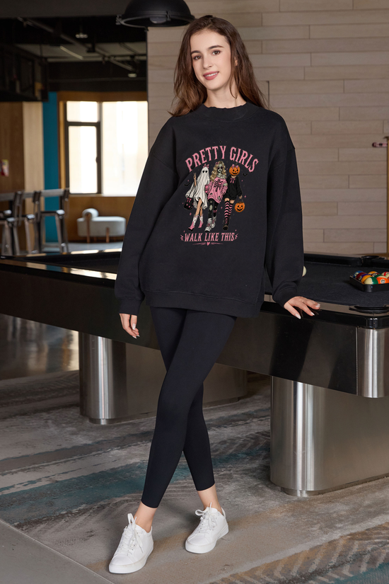 Moshita Pretty Girls Walk Like This mockneck sweatshirt in black — graphic front view 1