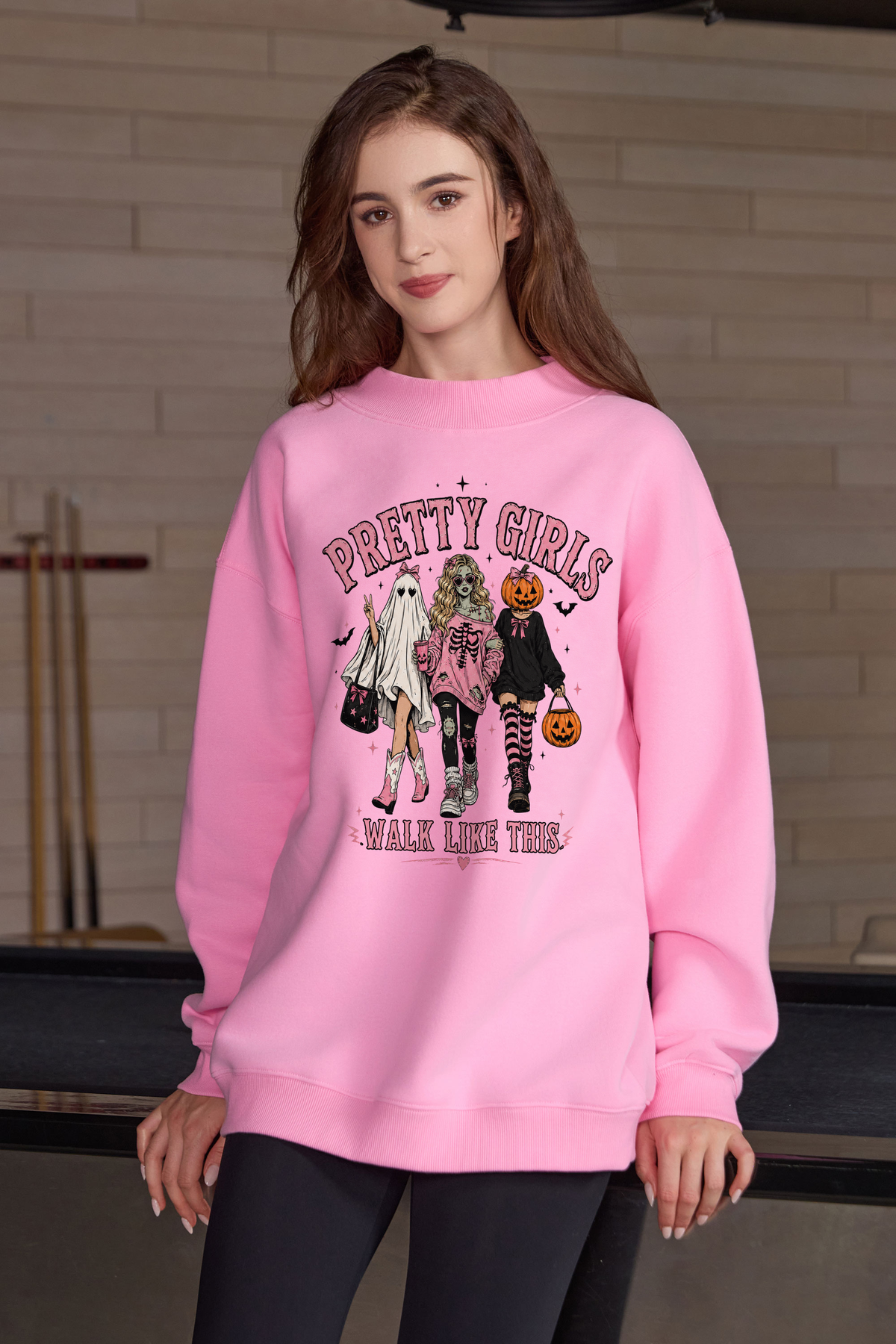 Moshita Pretty Girls Walk Like This mockneck sweatshirt in light pink — graphic front view 2