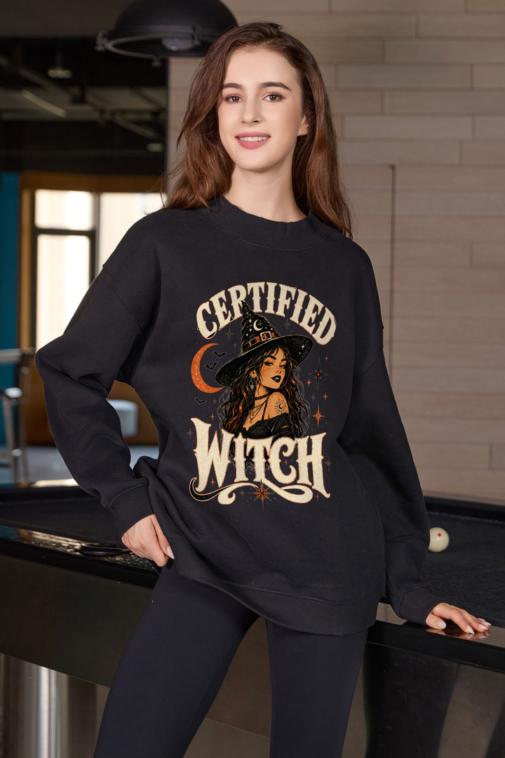 Moshita Certified Witch mockneck sweatshirt in black — graphic front view 2
