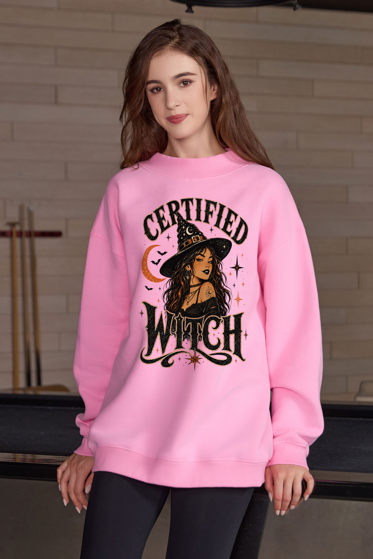 Moshita Certified Witch mockneck sweatshirt in light pink — graphic front view 1