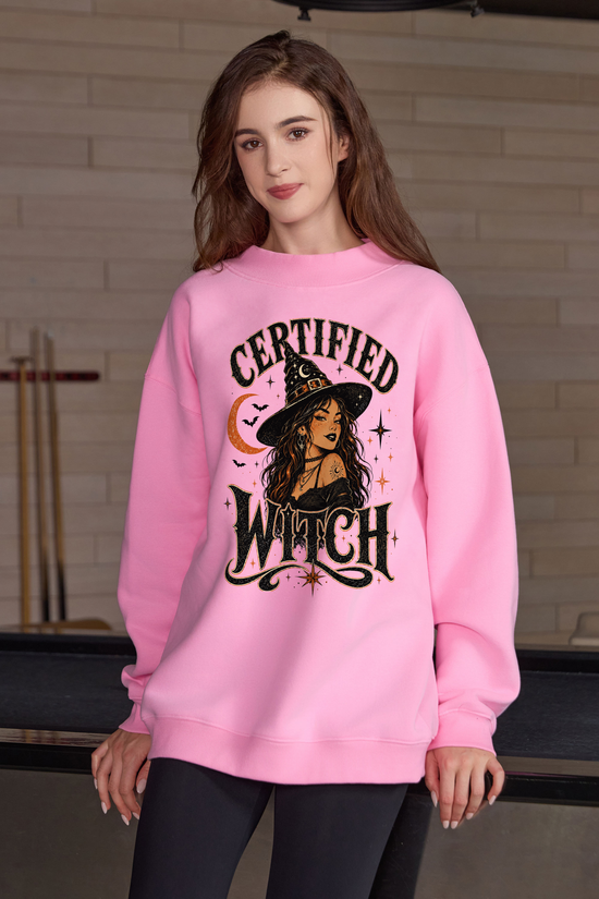 Moshita Certified Witch mockneck sweatshirt in light pink — graphic front view 1
