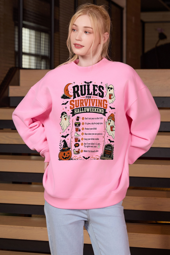 Moshita Rules for Surviving Halloweekend mockneck sweatshirt in light pink — graphic front view 2