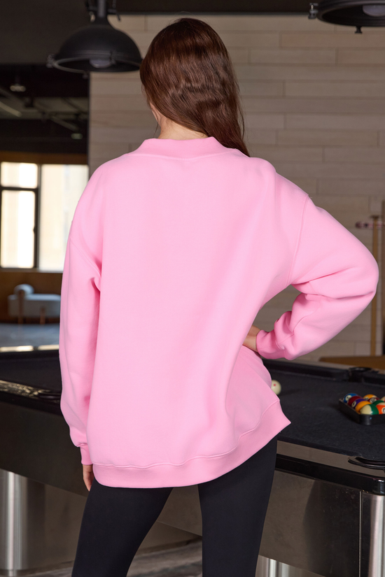 Moshita Rules for Surviving Halloweekend mockneck sweatshirt in light pink — plain back view