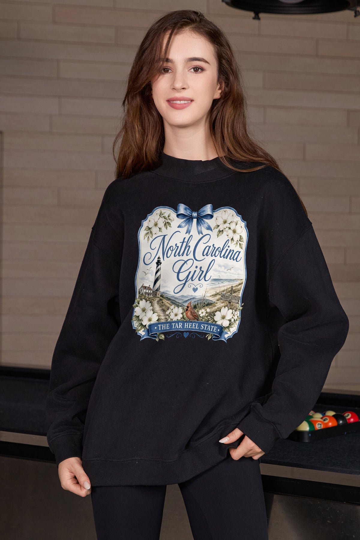 North Carolina Girl Illustrated Sweatshirt in black — model view 1.