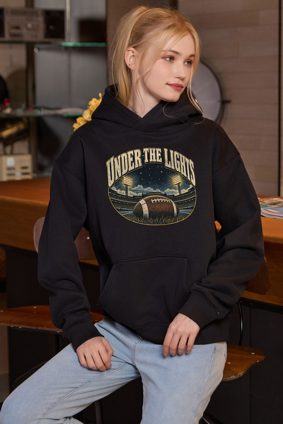 Under the Lights Hoodie in black, front graphic on model, view 2
