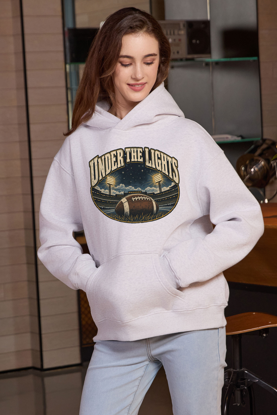 Under the Lights Hoodie in heather grey, front graphic on model, view 1