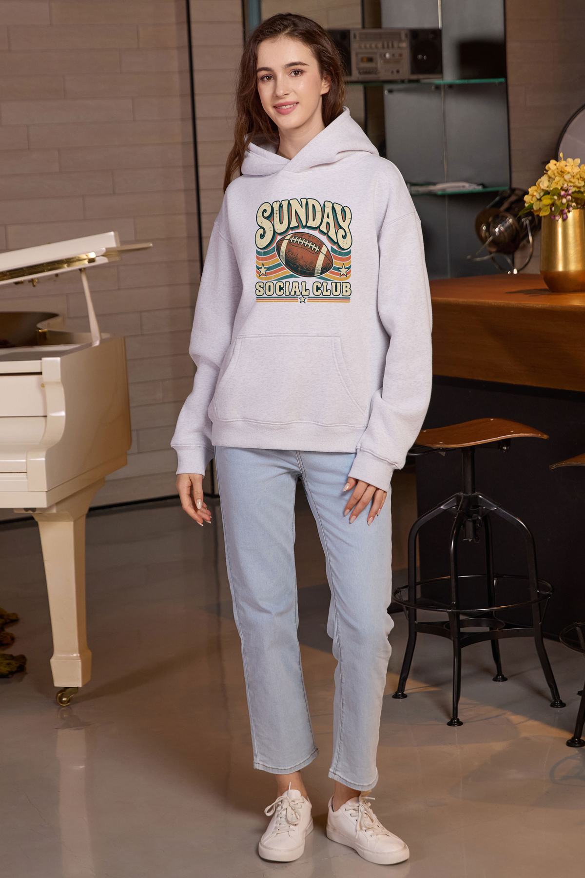 Sunday Social Club Hoodie in heather grey, front graphic on model, view 1