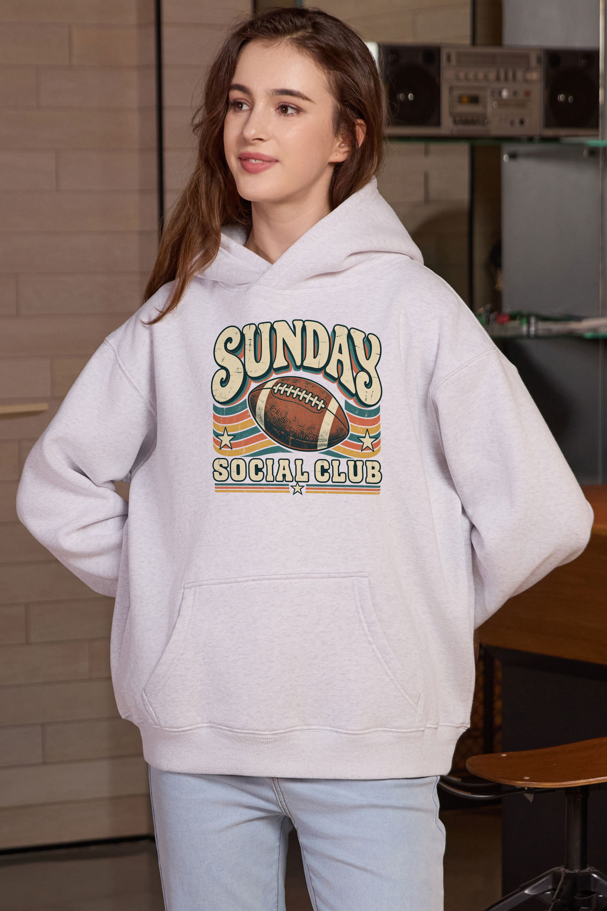 Sunday Social Club Hoodie in heather grey, front graphic on model, view 3