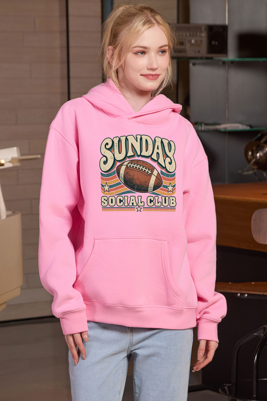 Sunday Social Club Hoodie in light pink, front graphic on model, view 3