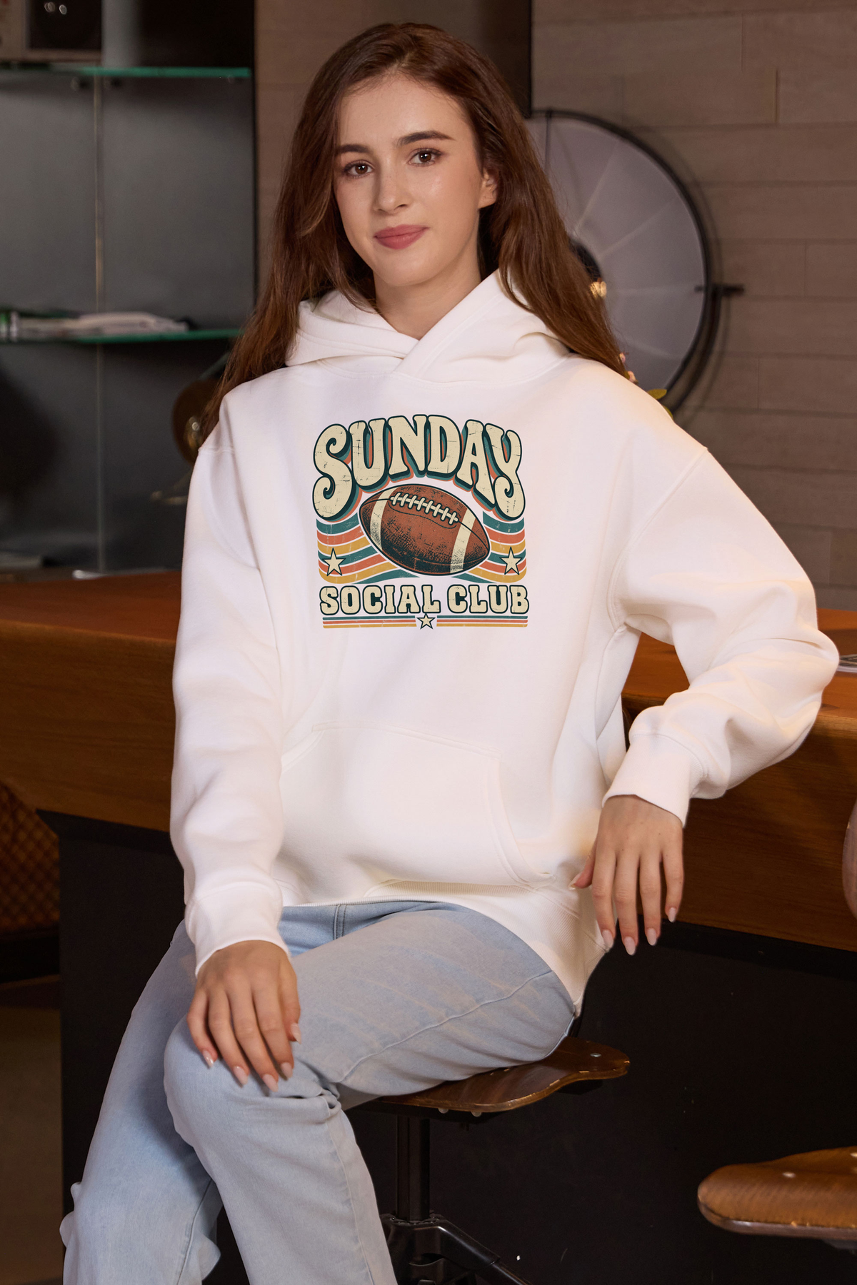 Sunday Social Club Hoodie in white, front graphic on model, view 1