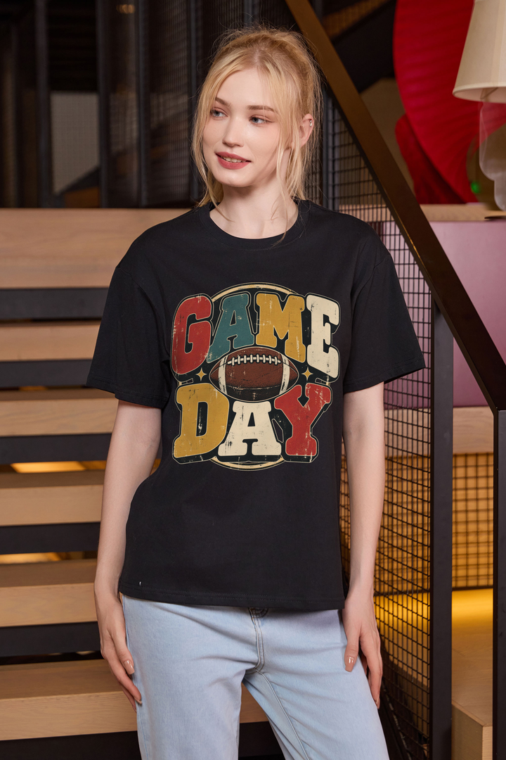Retro Game Day Relaxed Tee in black with multicolour GAME DAY lettering and a football graphic.