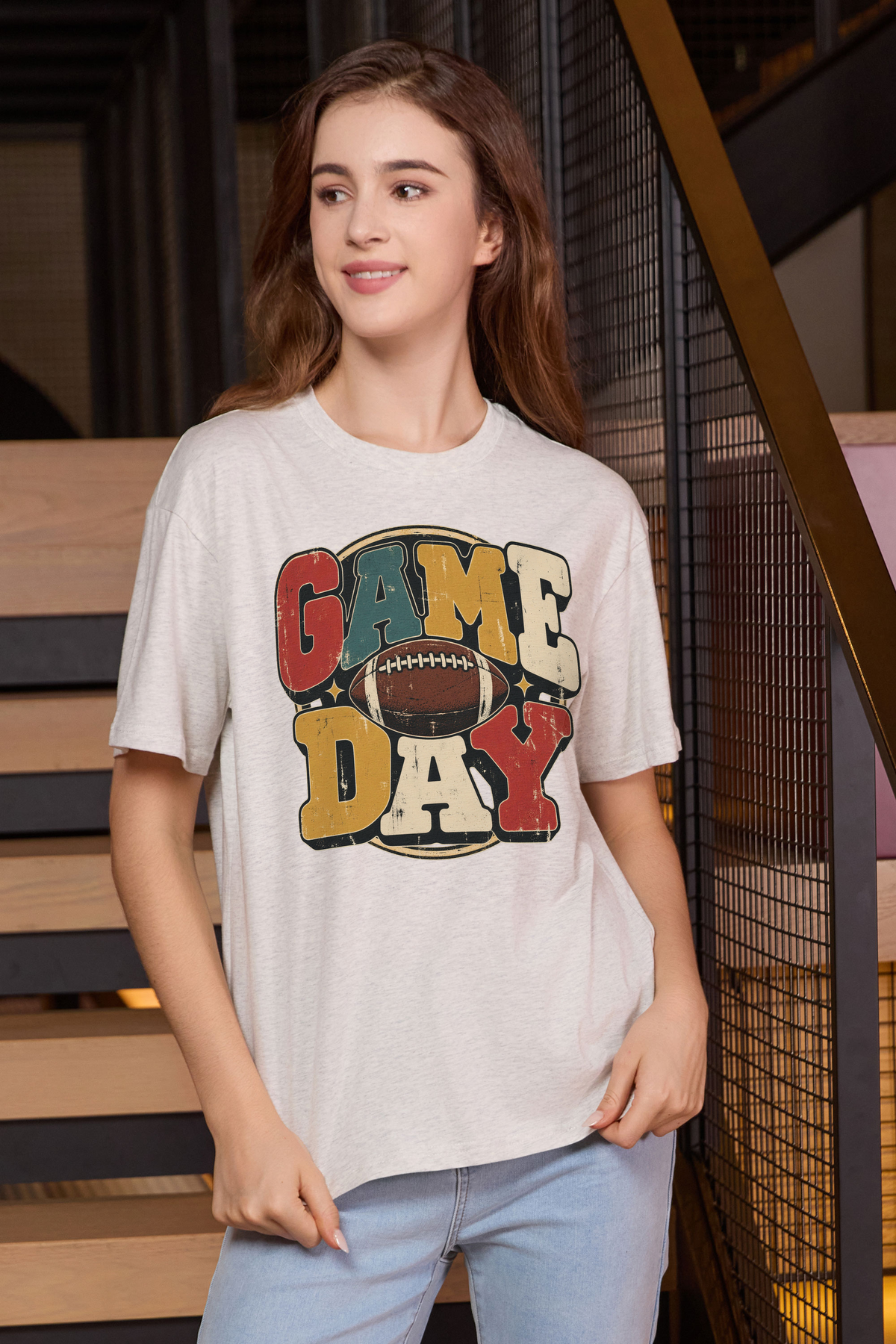 Retro Game Day Relaxed Tee in heather grey with multicolour GAME DAY lettering and a football graphic.