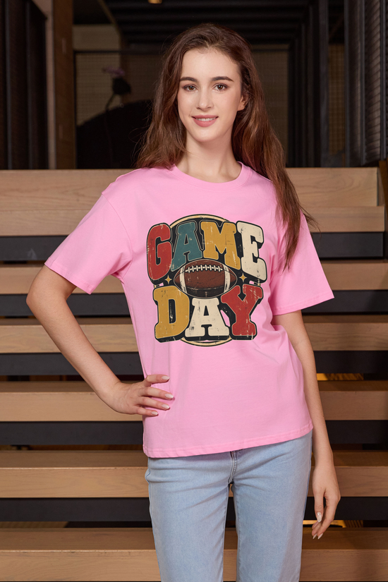 Retro Game Day Relaxed Tee in light pink with multicolour GAME DAY lettering and a football graphic.