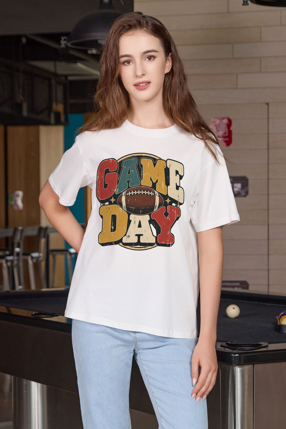 Retro Game Day Relaxed Tee in white with multicolour GAME DAY lettering and a football graphic.