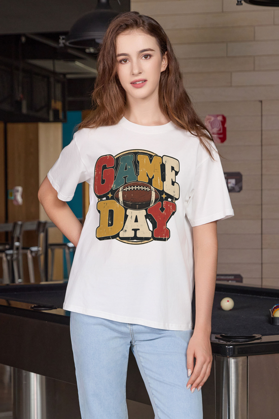 Retro Game Day Relaxed Tee in white with multicolour GAME DAY lettering and a football graphic.
