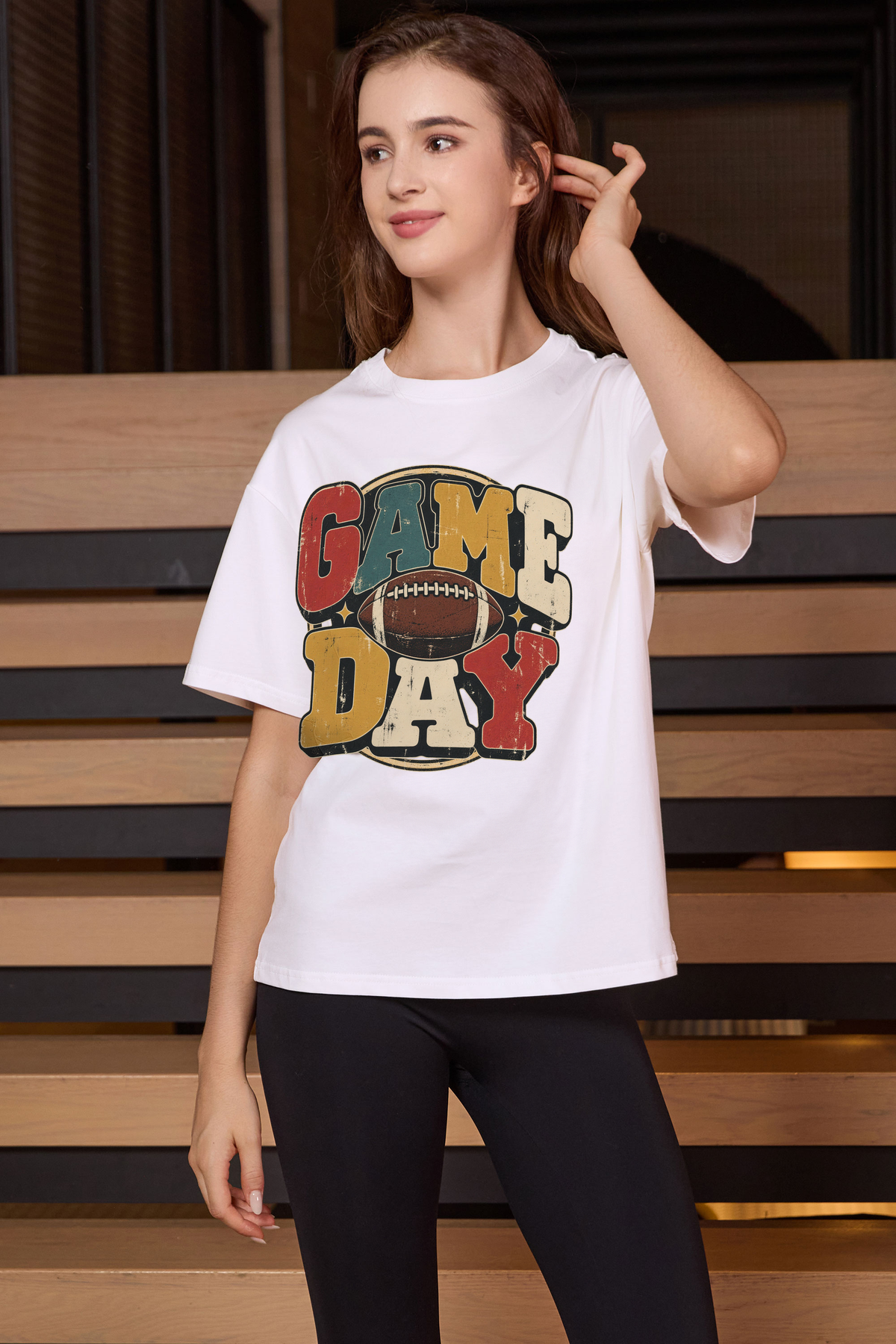 Retro Game Day Relaxed Tee in white with multicolour GAME DAY lettering and a football graphic.